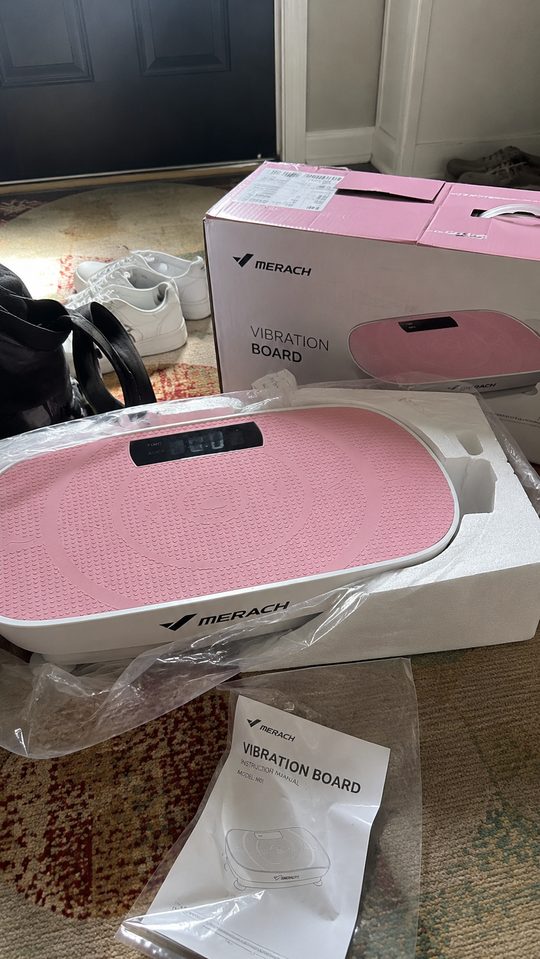 Happy LumiFit customer using the vibration board
