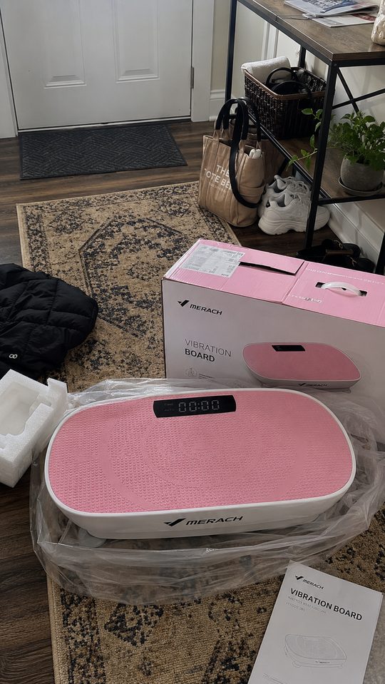 Happy LumiFit customer using the vibration board