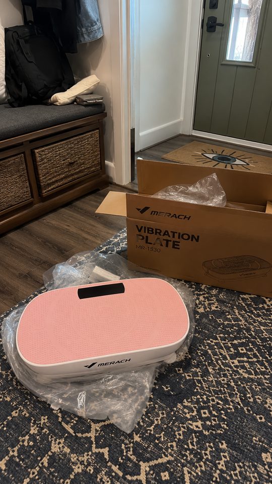 Happy LumiFit customer using the vibration board
