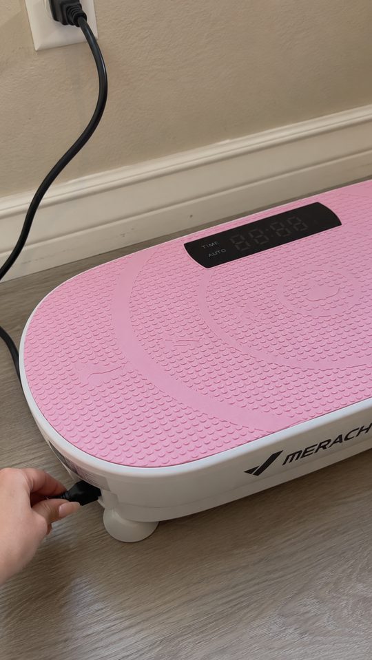 Happy LumiFit customer using the vibration board