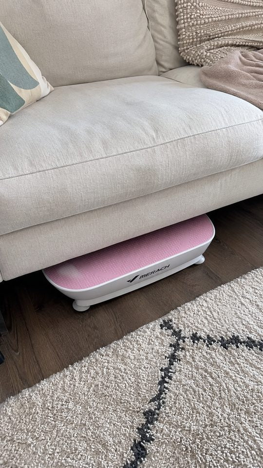 Happy LumiFit customer using the vibration board
