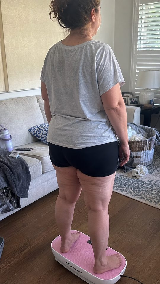 Happy LumiFit customer using the vibration board